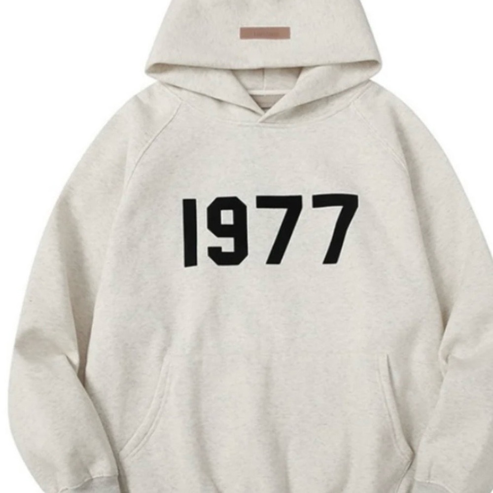 Fear of God Cream Hoodie with Black 1977 Graphic